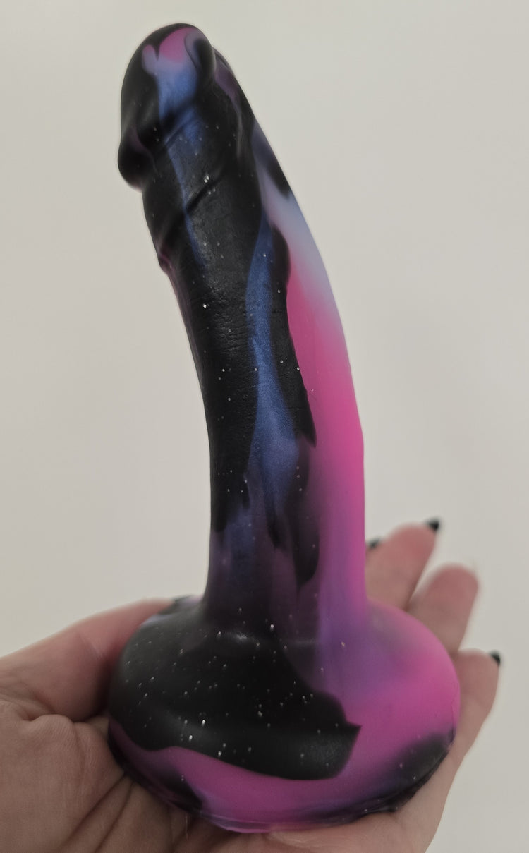 ONE OF A KIND Small Bent Galaxy